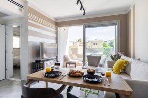 Chic Urban Getaway with Balcony & Mamad by Sea N' Rent